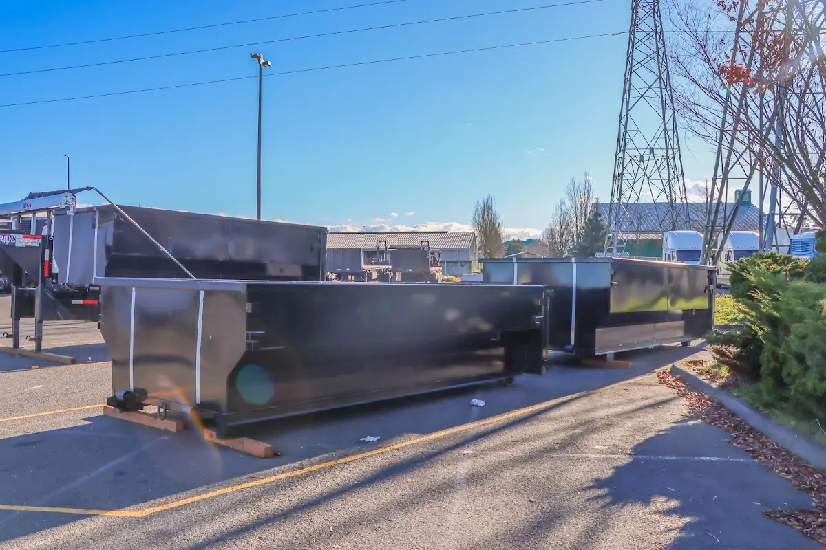 Roll-off dumpster ready for waste disposal at job site for Construction Dumpster Rental in Dakota Ridge